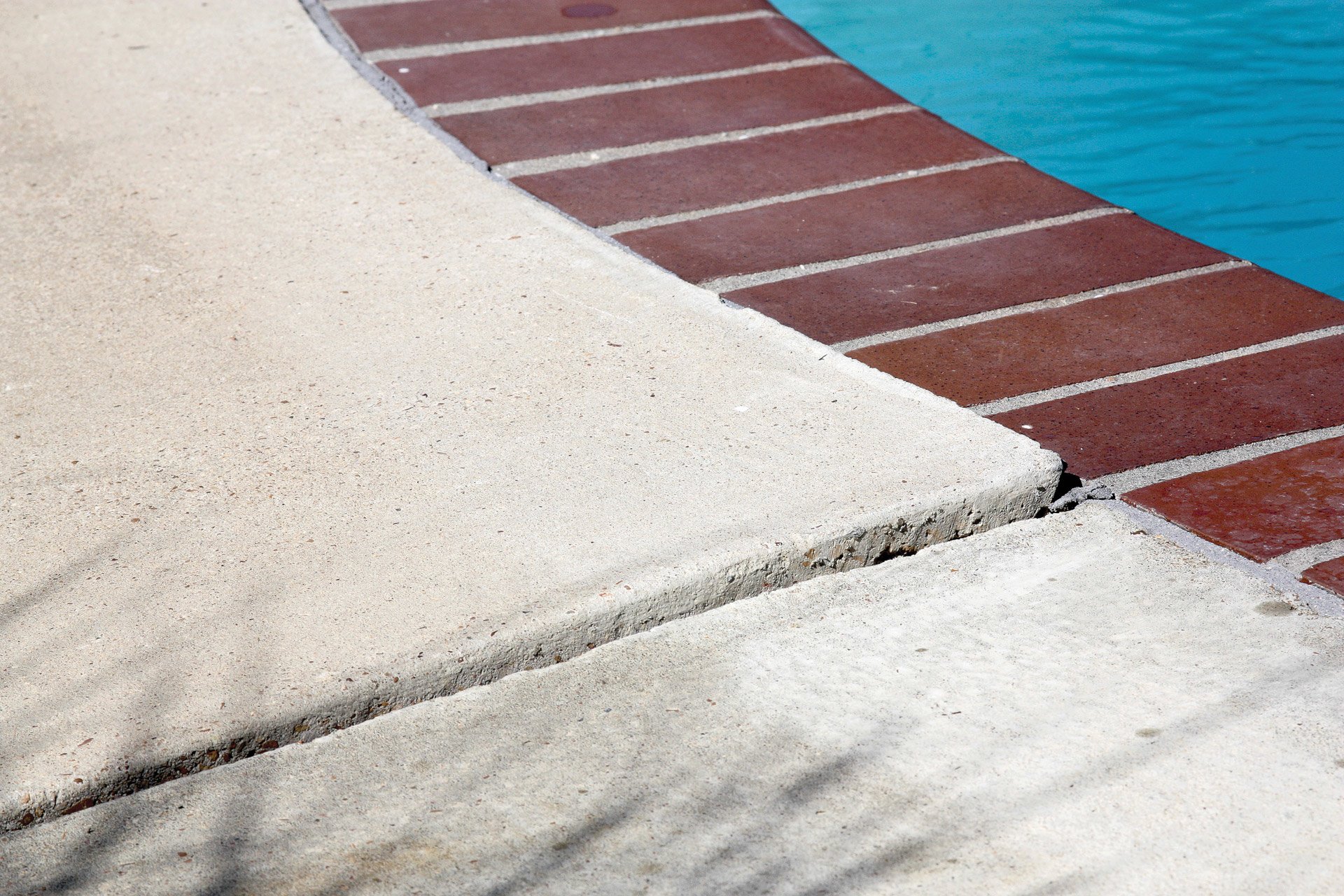 Example of uneven concrete on pool deck