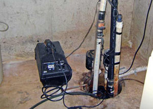 Pedestal sump pump system installed in a home in Loveland