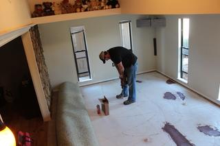 Setting Injection Ports in slab after carpet has been rolled back.