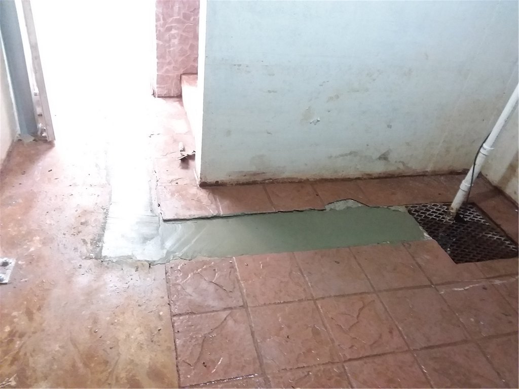 The trench drain outside is directed directly to the sump system