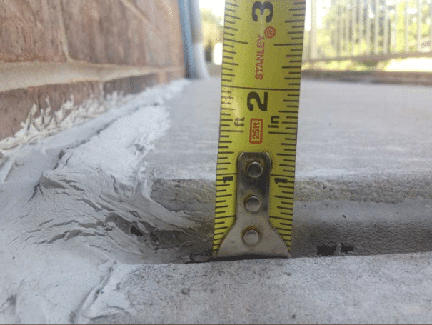 Are you experiencing this type of settlement on your home?  Sinking or cracking of concrete?