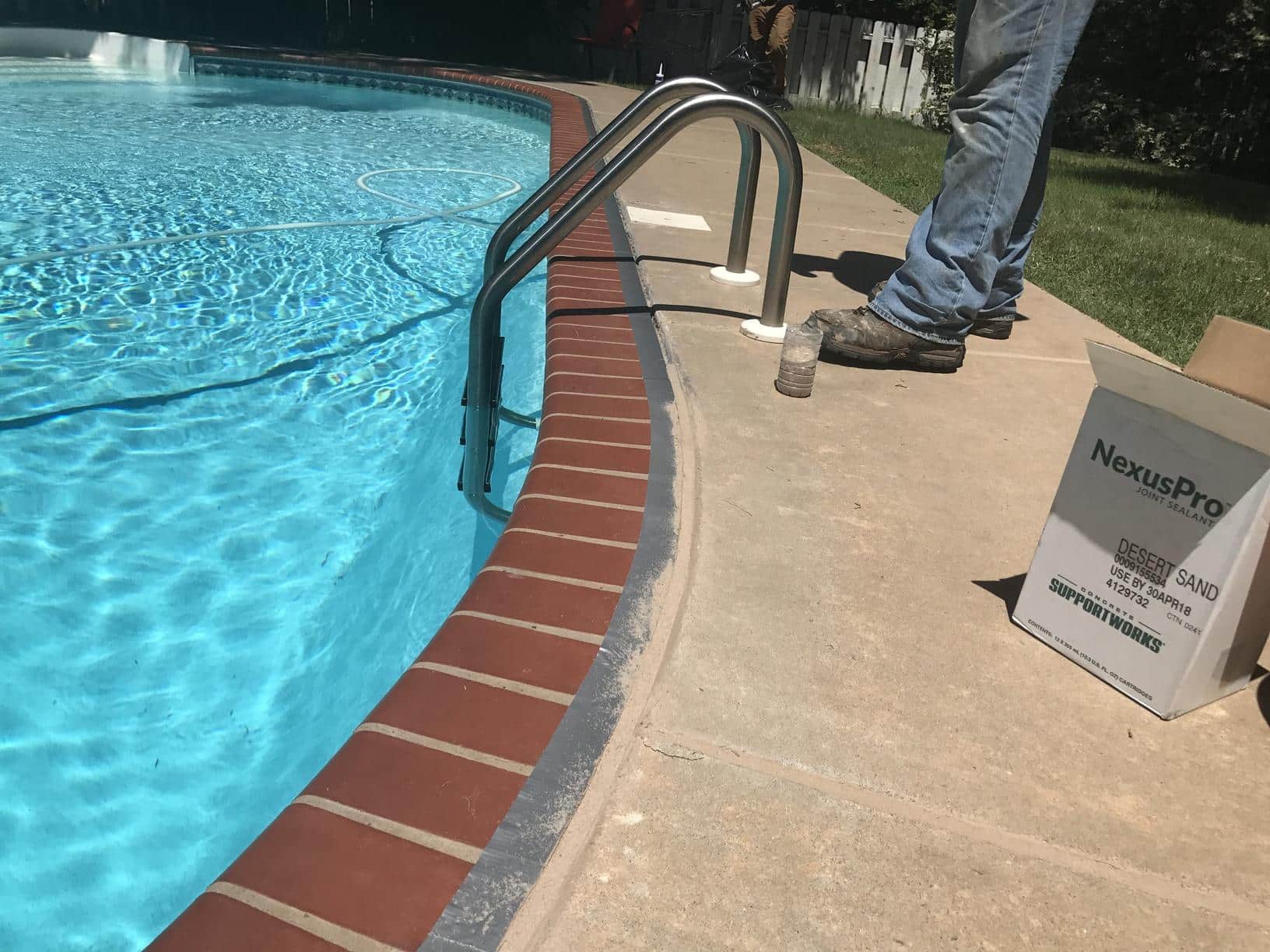 The pool edge is taped prior to finish for a nice clean edge.