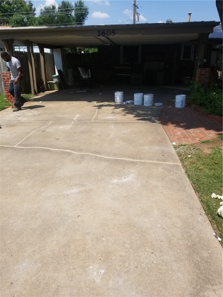 The driveway was swept clean and sealed along joints using Nexus Pro caulking.