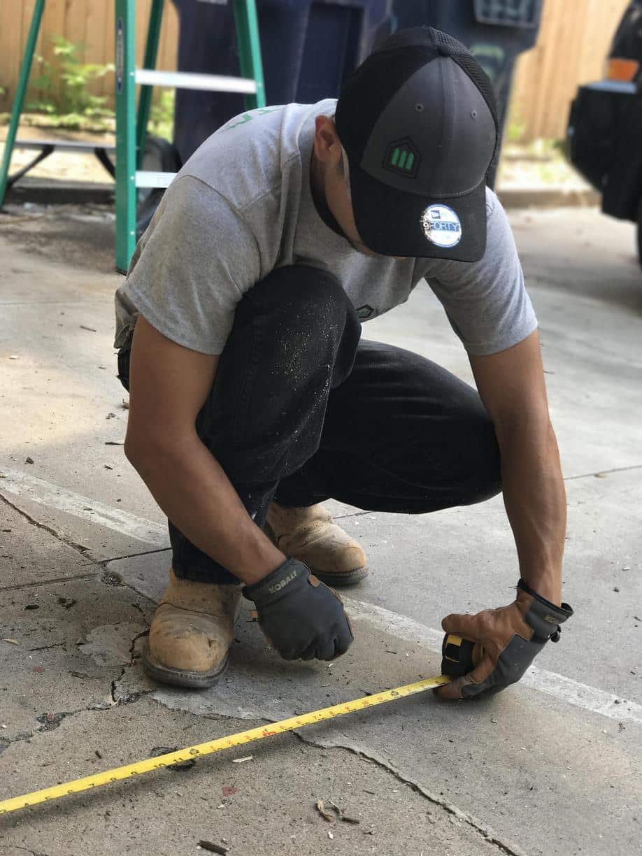 The holes are marked out at 24inches by 24 inches wide. This makes sure the weight of the home is distributed through the footing and not the surrounding soils.